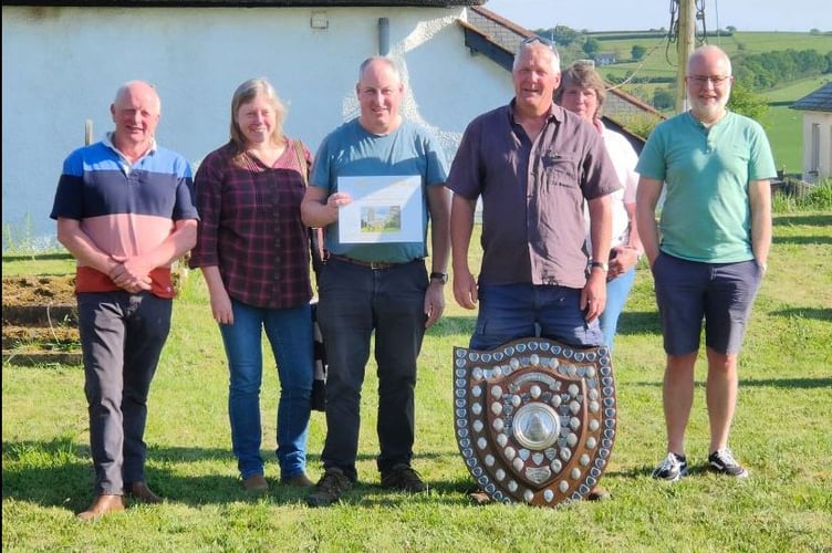 The winning Down St Mary team, from left: Andy Cleave (Tenor Bell), Jenny Sparling (3rd Bell), Ian Fielding (Treble Bell), Bob Robinson (5th Bell), Ali Waterson (4th Bell) and Gary Quick (2nd Bell).
