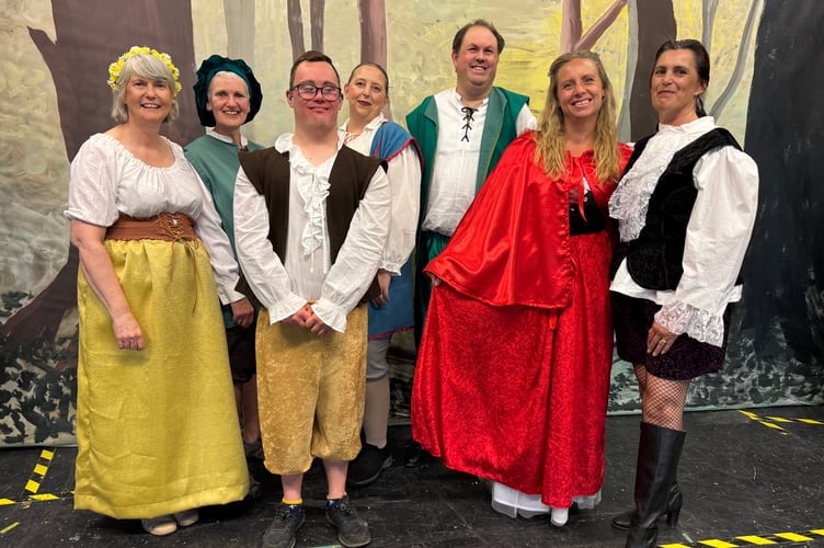 Red Riding Hood, played by Lucy Barzotelli, second right, and Jack (Lisle Purchase) with the Villagers (Towners), Katy Robins, Kerr Mills, Ben Thwaites, Ro Davies and Sue Knott.  AQ 1783
