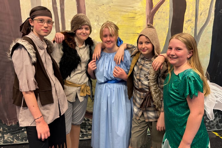 Tinkerbell (Siren Symons), right, and Wendy (Phoebe Kingdon-Steer), centre, with Lost Boys Elizabeth Robins, Isabel Robins and Rebecca Sims. Not present Peter Pan (Albany Powell).  AQ 1764
