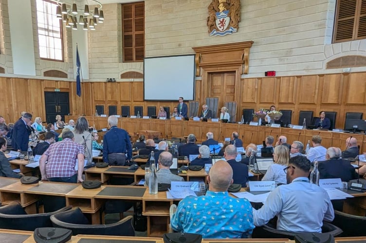 The first full council meeting of the new Devon County Council administration