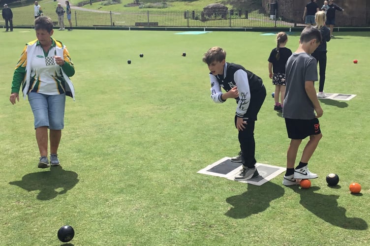 Having fun at the bowls taster session at Crediton Bowling Club.