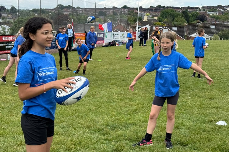 Cheriton Fitzpaine Primary School girls during one of the rugby games during the T1 Rugby Festival.  AQ 2268
