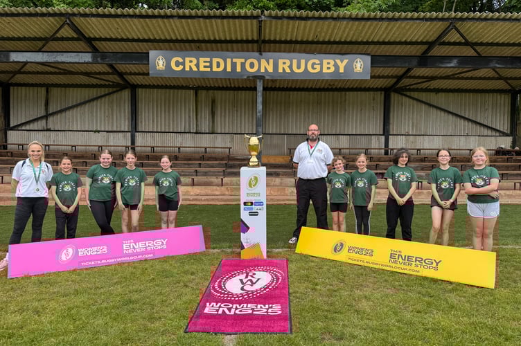 Exwick Tigers and leaders with the Women’s Rugby World Cup trophy.  AQ 2359
