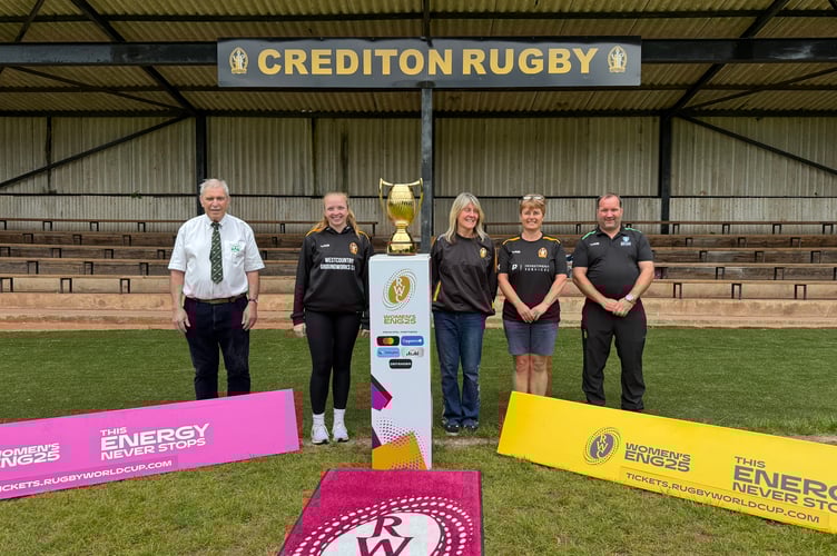Crediton RFC officers and volunteers with the Women’s Rugby World Cup trophy. AQ 2388