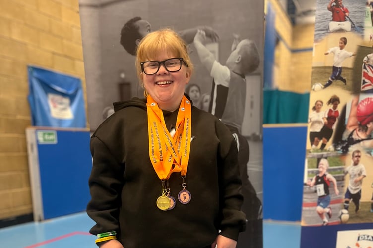 Dee Weiner with the medals she won at the National Dwarf Games.
