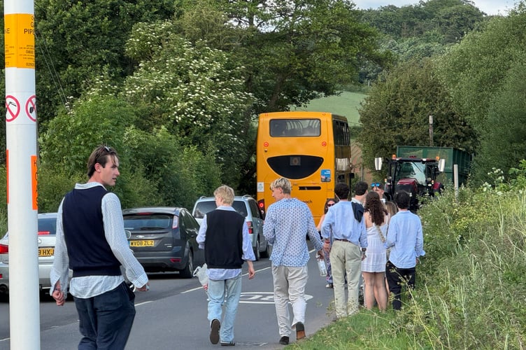 Students travelling by bus, taxi and on foot to Shobrooke Park for tonight’s Enchanted Garden Ball.  AQ 2905
