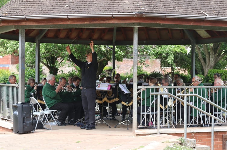 1 June 2025 Christians Together in Crediton Picnic in the Park 6x pic special Crediton Town Band played Christian songs and hymns (Will Goddard, Crediton Courier)