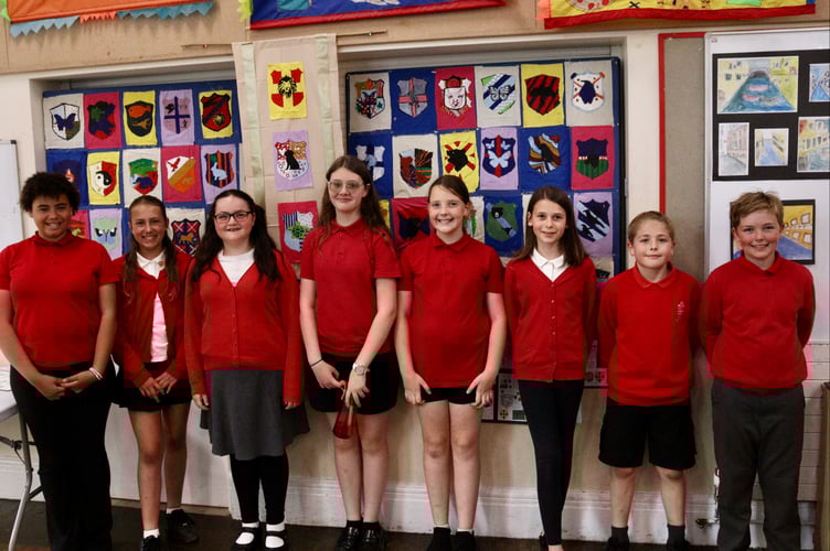 5 June 2025 Hayward's Primary School Take One Picture Venice art exhibition 6x pic special Year six students made multi-coloured boat team flags using acrylic paint and fabric (Will Goddard, Crediton Courier)