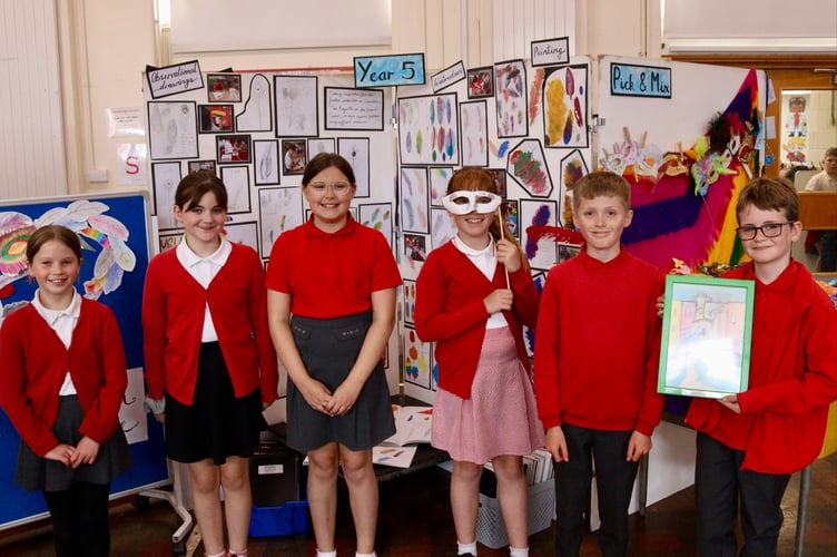 5 June 2025 Hayward's Primary School Take One Picture Venice art exhibition 6x pic special Year five used feathers in their creations, inspired by feather umbrellas in the painting (Will Goddard, Crediton Courier)