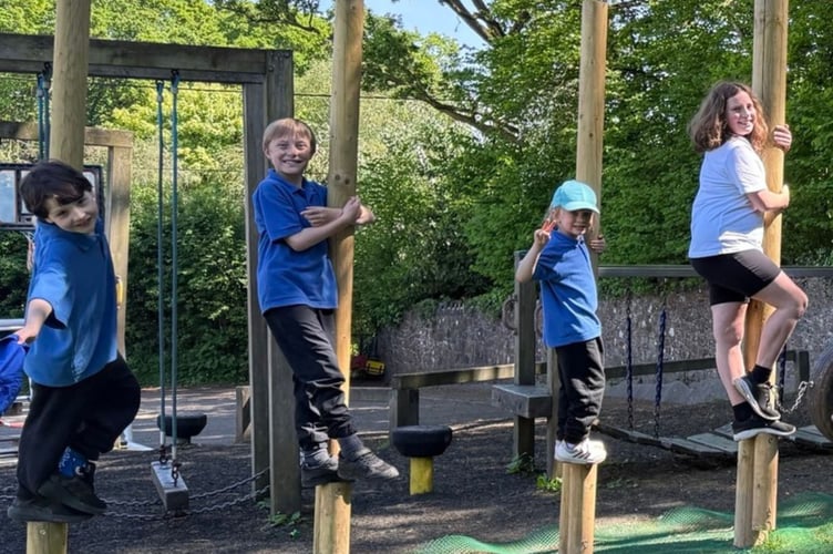 Students having fun on the assault course