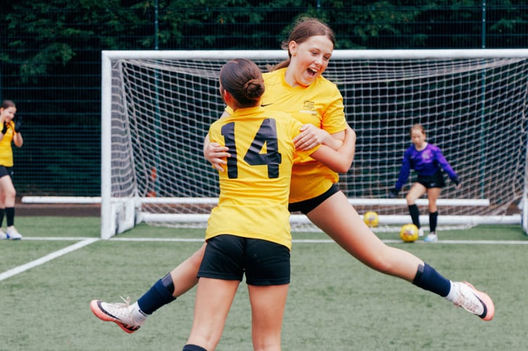 QE girls who took part in the tournament