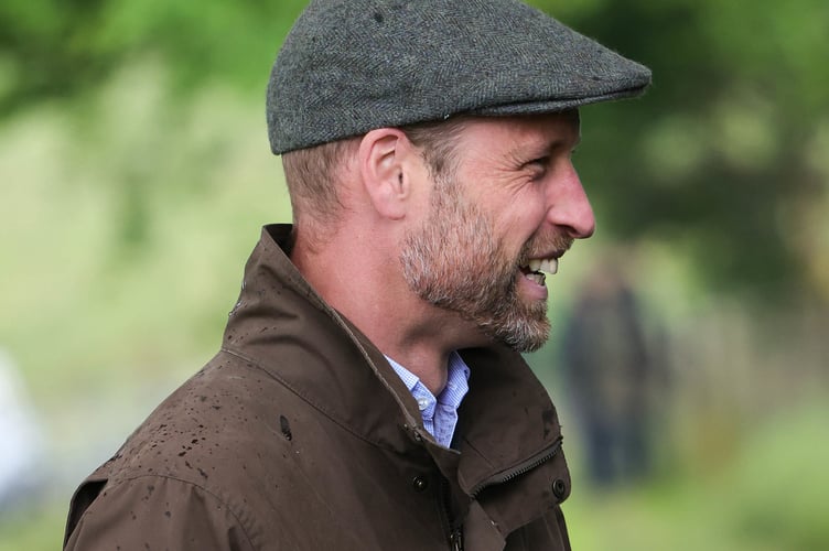 The Duke of Cornwall didn't let the weather get him down. Picture: Andrew Parsons/Kensington Palace.