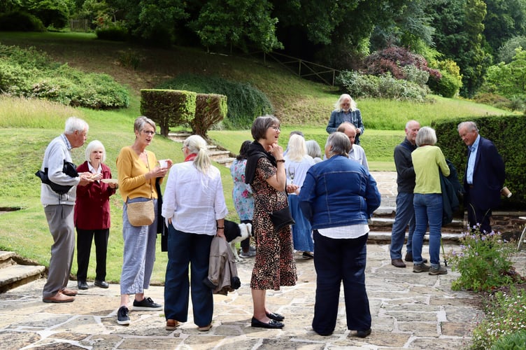 Attendees chatting in the grounds of Sherwood House