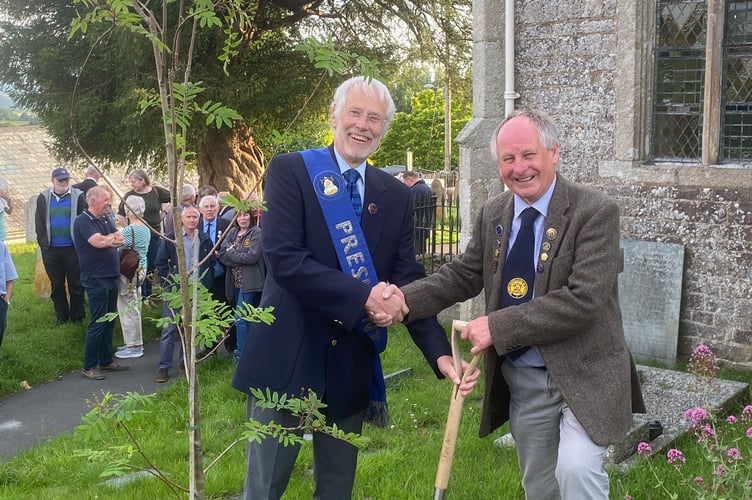 Ian Avery, president, Devon Association of Ringers and James Steer, Association chairman, planted a tree to mark 100 years since the founding of the association at Zeal Monachorum.