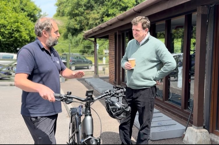 Mel Stride MP, right, talking at Partridge Cycles before he tried out riding an e-bike.
