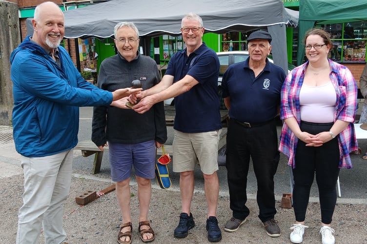 The Mayor of Crediton, Cllr Steve Huxtable, left, presents the Boules runner-up trophy to the Forrester’s.
