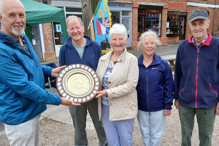 The Mayor of Crediton, Cllr Steve Huxtable, left, presents the Boules trophy to the winners, Golden Balls.

