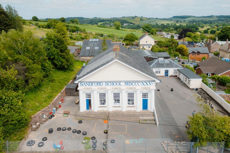 Sandford School with its impressive Greek columns at the front of the building.
