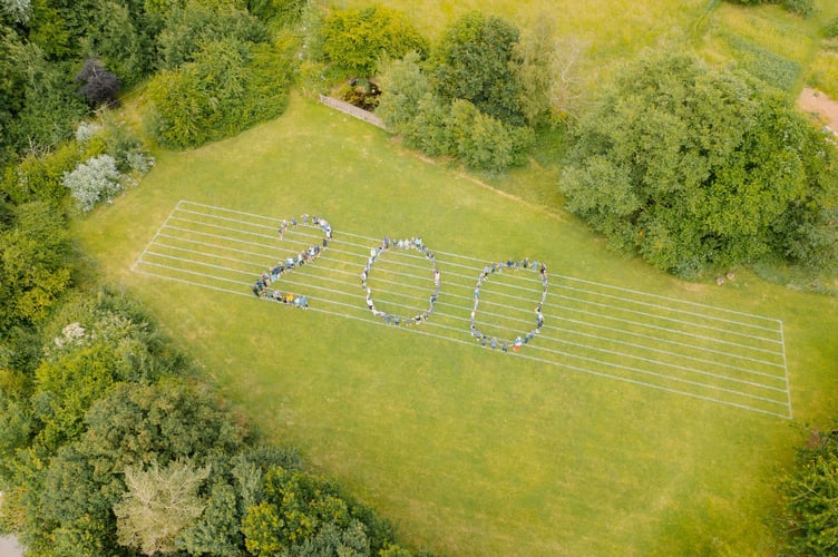 Children and staff created a giant ‘200’ on Sandford School field ahead of a day of celebration to mark 200 years of the school.
