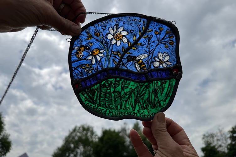 The stained glass gift made by Penny Somerville which was given to Linda Lever. AQ 4682