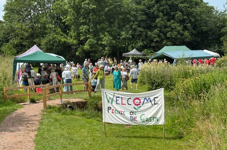 A Welcome Sign greeted those attending the Picnic on the Green at Sandford. Q 4702
