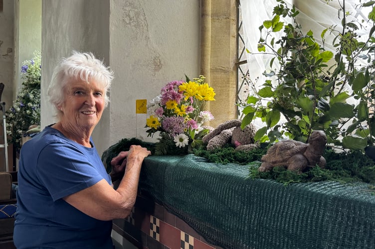 Dee Warren part way through creating her display on the theme of ’The Hare and the Tortoise’.  AQ 4515