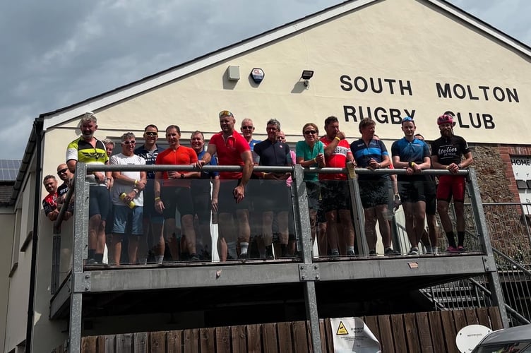 Some of the cyclists who stopped at South Molton Rugby Club.
