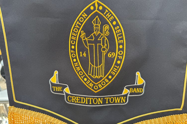 A Crediton Town Band banner. AQ 4259