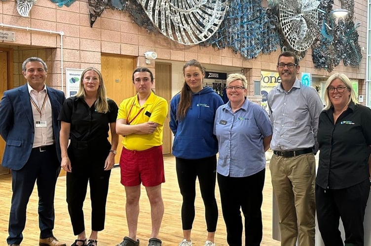 Cllr Josh Wright, left, with staff at Active Tiverton