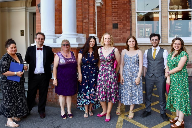 Tamlyn Fraiquin of Involve Mid Devon, left, with QE staff