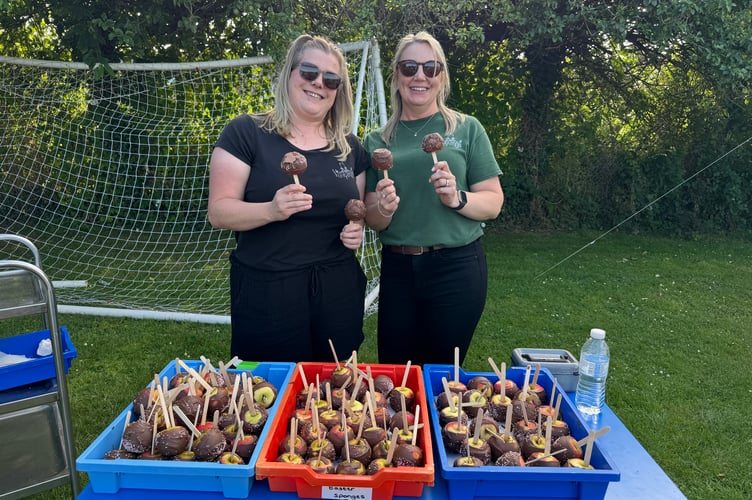 Chocolate covered apples are always popular at the fete. AQ 5124