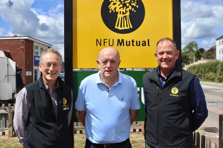 Insurance Agents Jeremy Atkins, left, and Richard Pym, right, of NFU Mutual with Age Concern Crediton Trustee and Treasurer John Potter