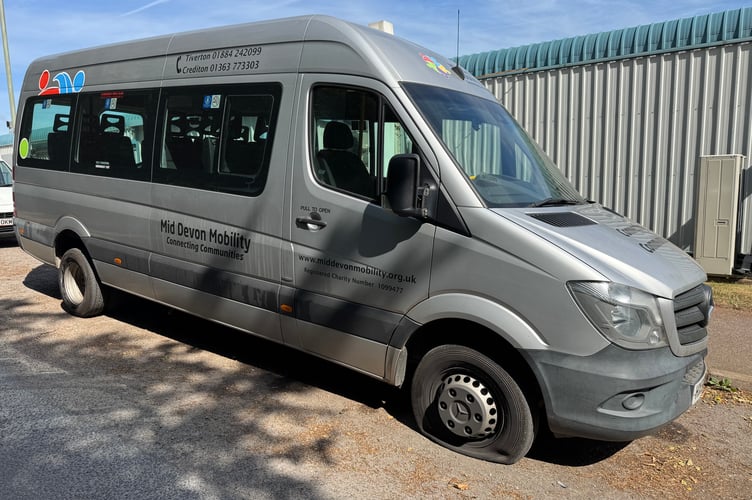 The Crediton Mid Devon Mobility minibus which has had three tyres stabbed.  AQ 5735

