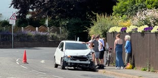 Warning to motorists of car on bend after crash in Crediton
