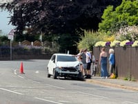 Warning to motorists of car on bend after crash in Crediton
