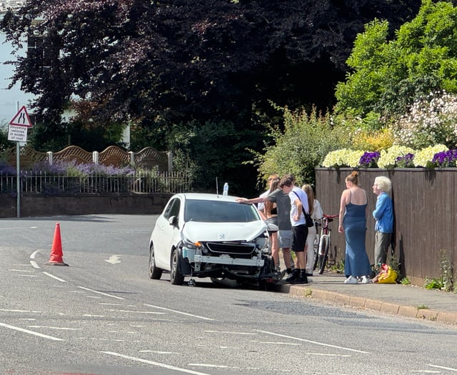 Warning to motorists of car on bend after crash in Crediton
