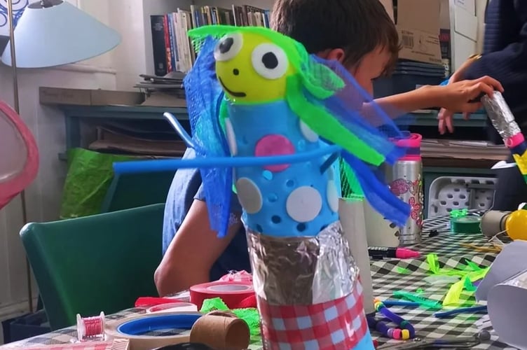 Make a robot out of recycled materials.
