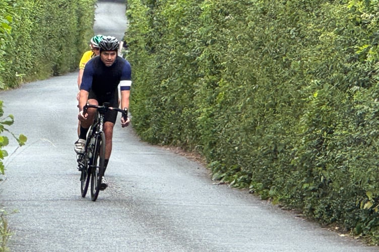 Cyclists taking part in the Nello on Higher Road in Crediton. AQ 5316