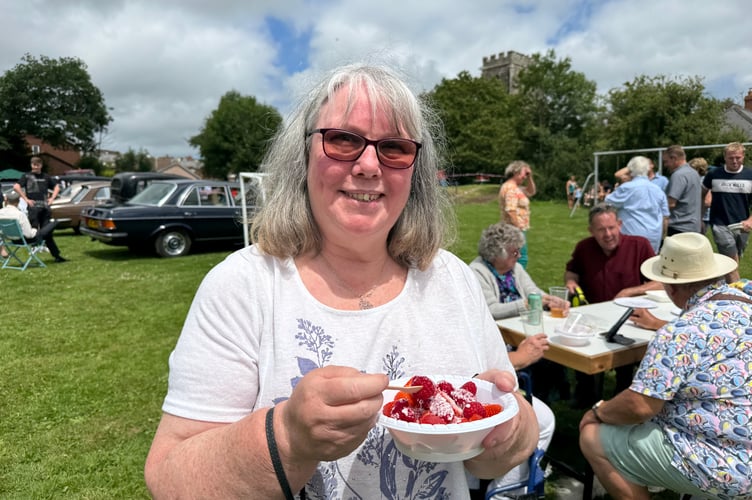 Enjoying some raspberries and strawberries at Lapford Playing Field Vintage Rally.  AQ 5253
