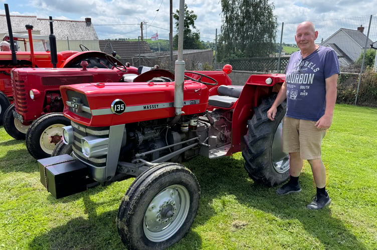 Terry Hopkins displayed his 1965 Massey Ferguson 135 tractor.  AQ 5283
