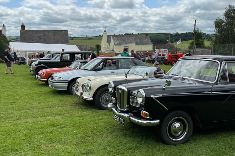 Some of the classic cars on display in Lapford Play area on the day the new play equipment was officially opened.  AQ 5252
