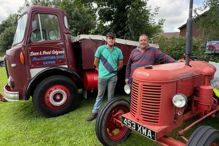 Nigel Colgrave, right, and his son Daniel, of Lapford, vintage tractor and vehicle restorers, took along some of their vehicles for the rally and were the event sponsors. AQ 5290
