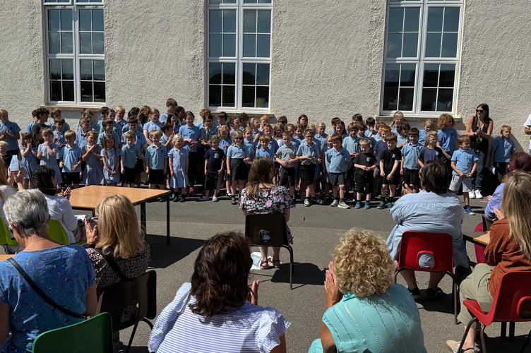Children sang songs as part of the Sandford School 200th celebrations.  AQ 5500
