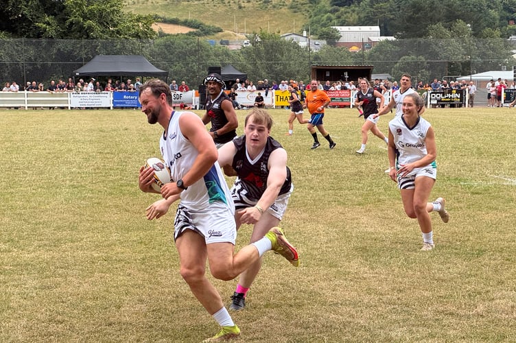 Fast-paced touch rugby was enjoyed at the Yeandle Testimonial at Crediton RFC.  AQ 5904
