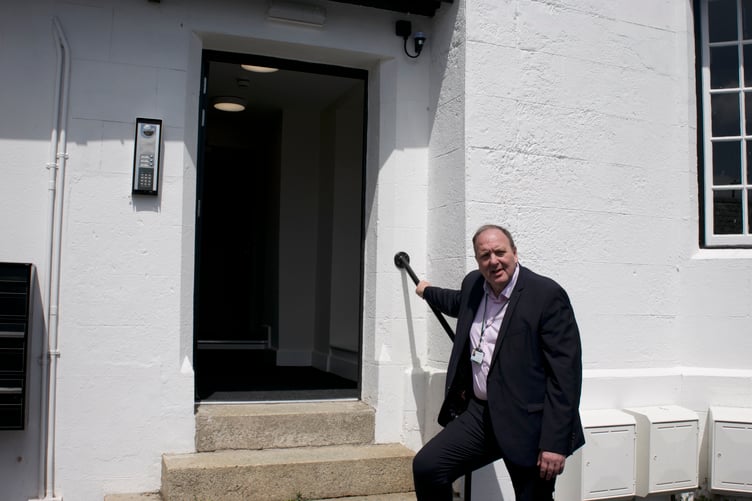 West Devon Borough Cllr Mark Renders unveils a new block of temporary accommodation to help ease the housing crisis. Picture by Jude Wright.
