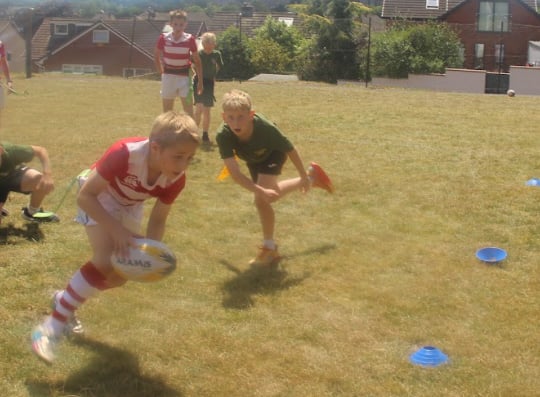 Primary school children taking part in the Crediton area school’s rugby festival.