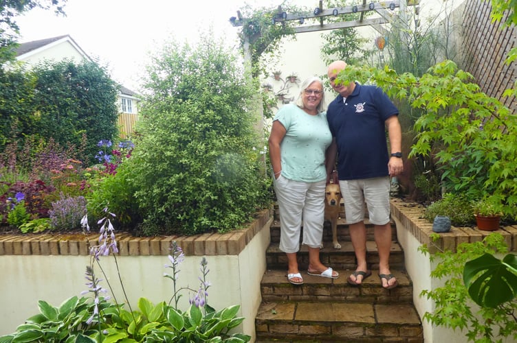 James and Erica Mason in their garden