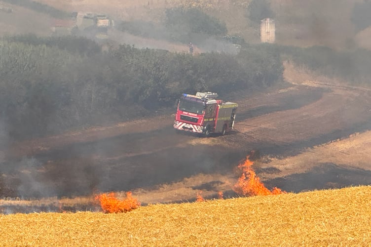 A fire engine in a further part of the Crediton field. AQ 6576