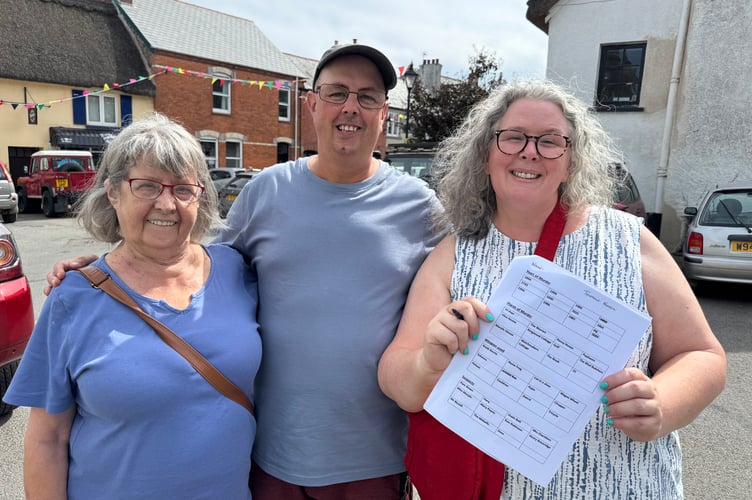 Jeannette, Paul and Clare during the Murder Mystery trail around Winkleigh as part of Winkleigh Fair. AQ 6685