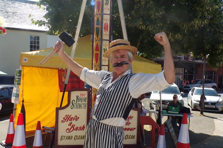 Dr Pandemonius Fish of Promenade Promotions with a test-your-strength game